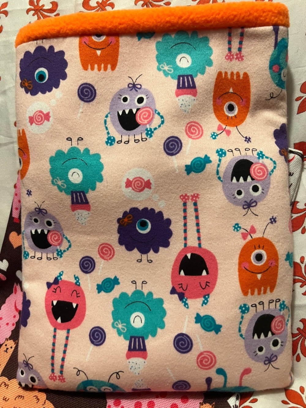 Wonderland sleeve Kids Monster Print Pink Pouch with Orange Trim